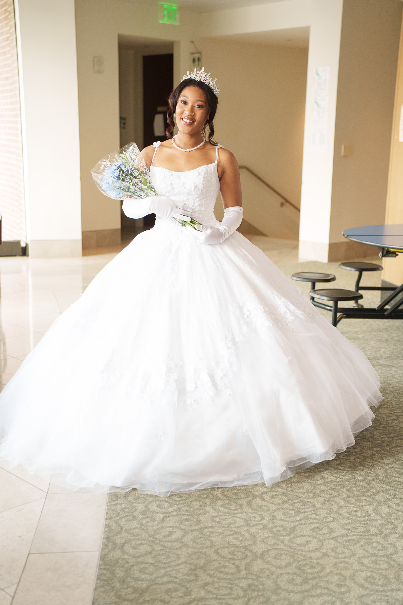 Featured debutante and escort on staircase